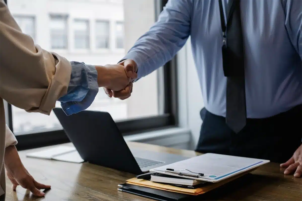 Car lawyer hand shake